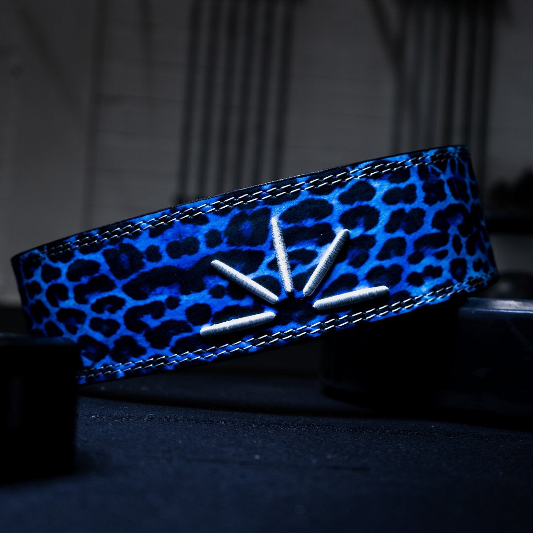 Trackfie lever belt with blue leopard print seen from behind with the belt diagonal