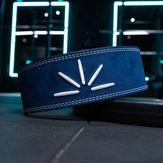 Navy blue Trackfie lever belt seen from behind with the belt diagonal