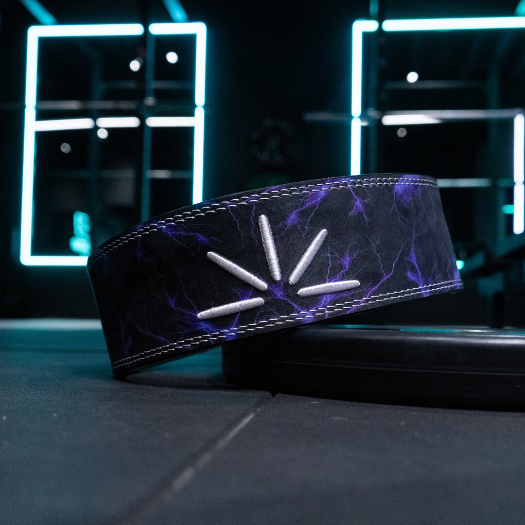 Trackfie lever belt with purple lightning print seen from behind with the belt diagonal