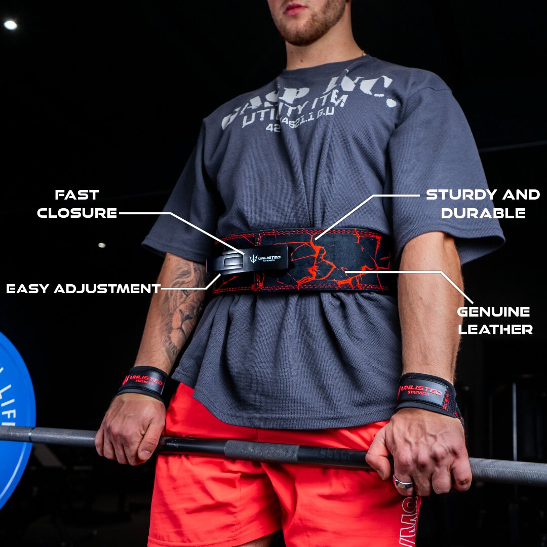 Man wearing red Unlisted Strength lifting belt with belt specifications highlighted