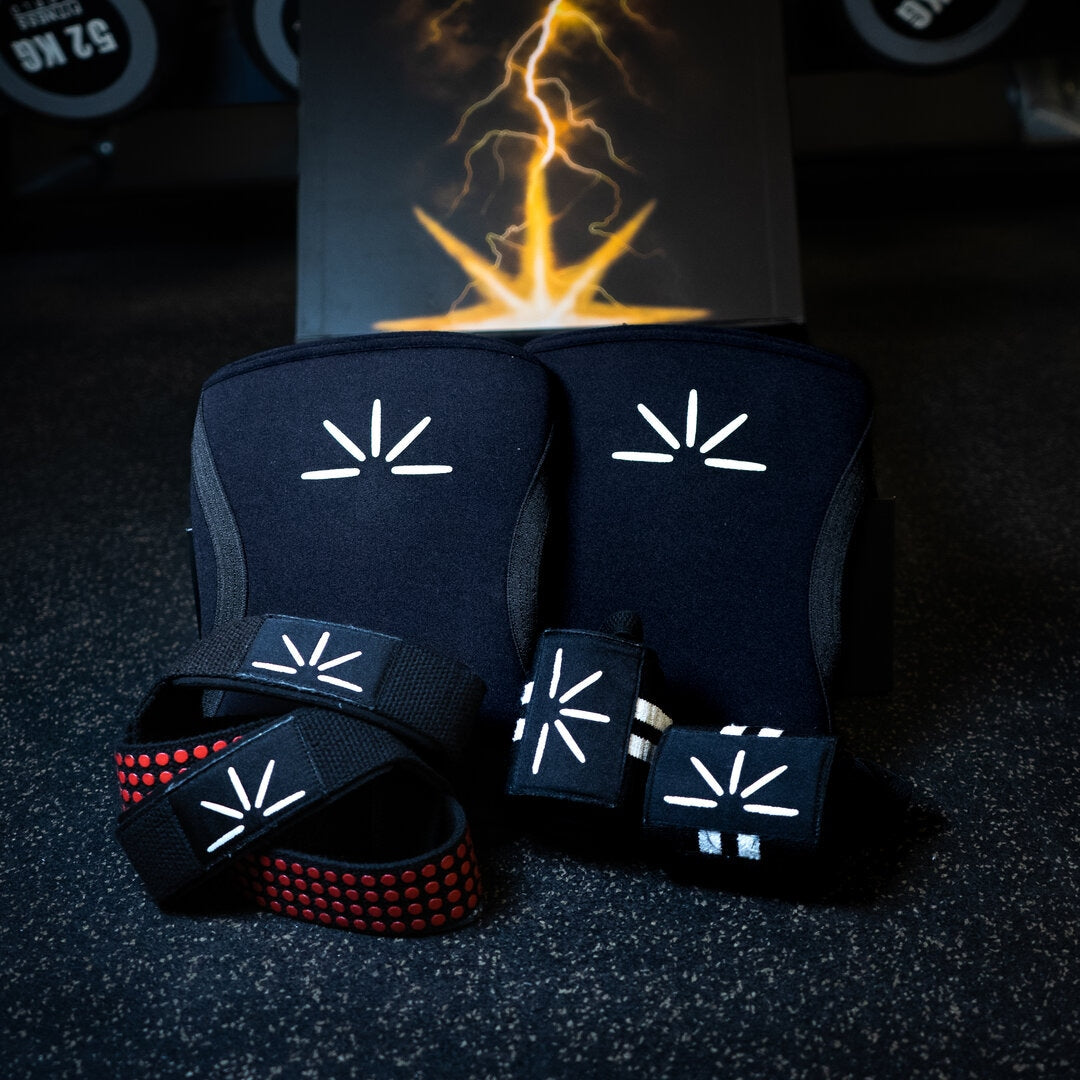Trackfie assistance bundle consisting of knee sleeves, lifting straps, and wrist wraps